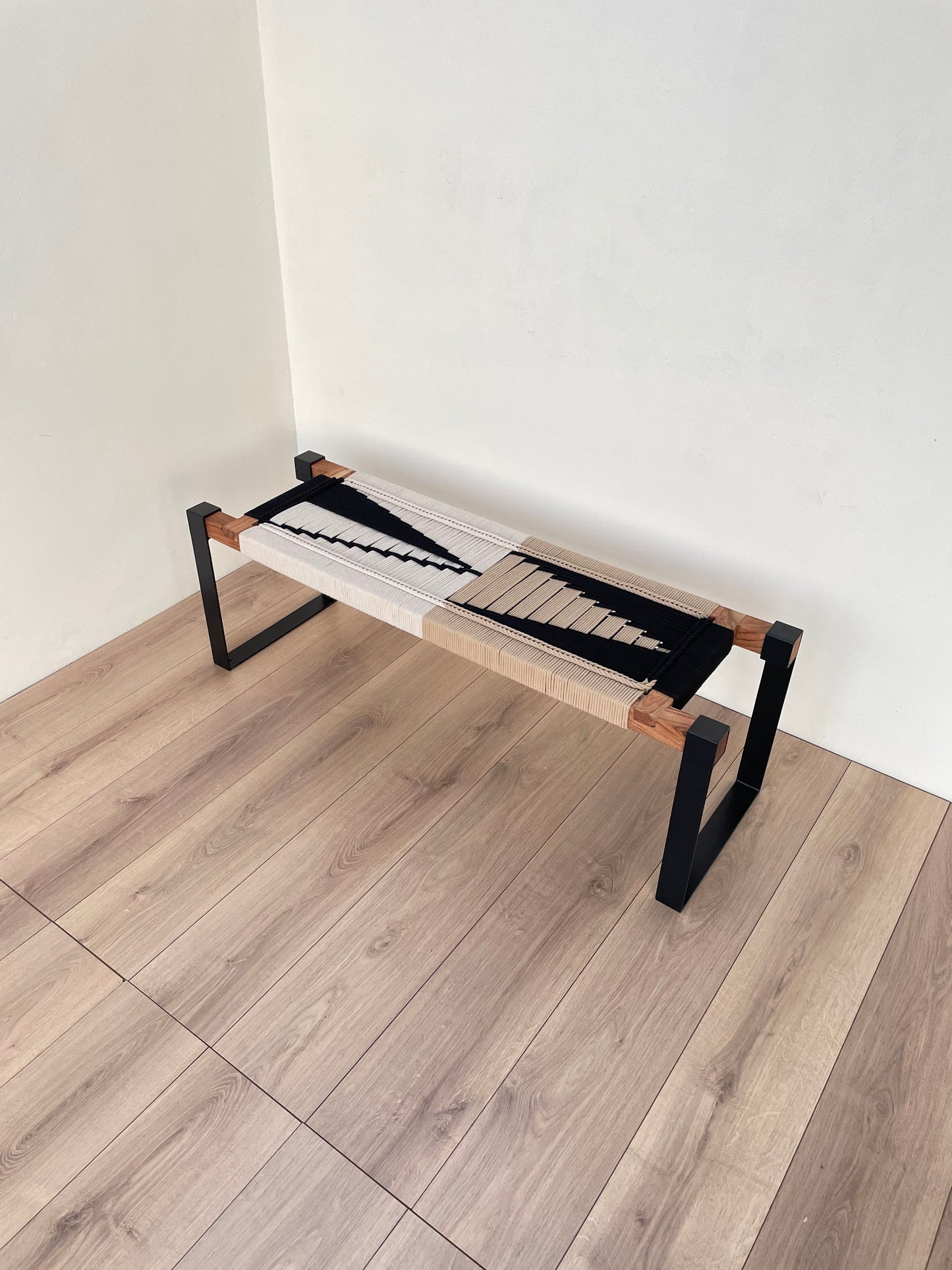 Draco woven bench in black metal legs