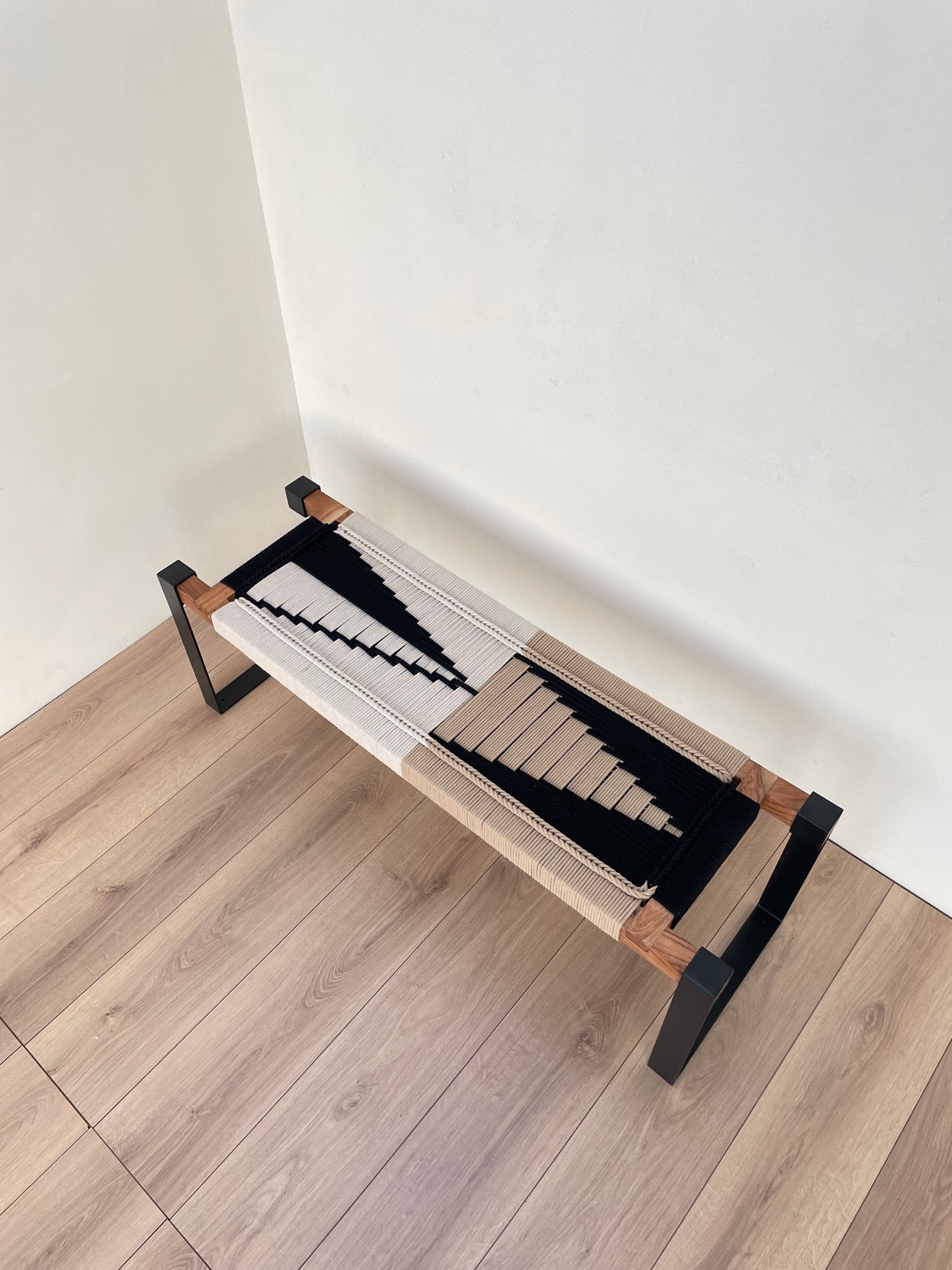 Draco woven bench in black metal legs