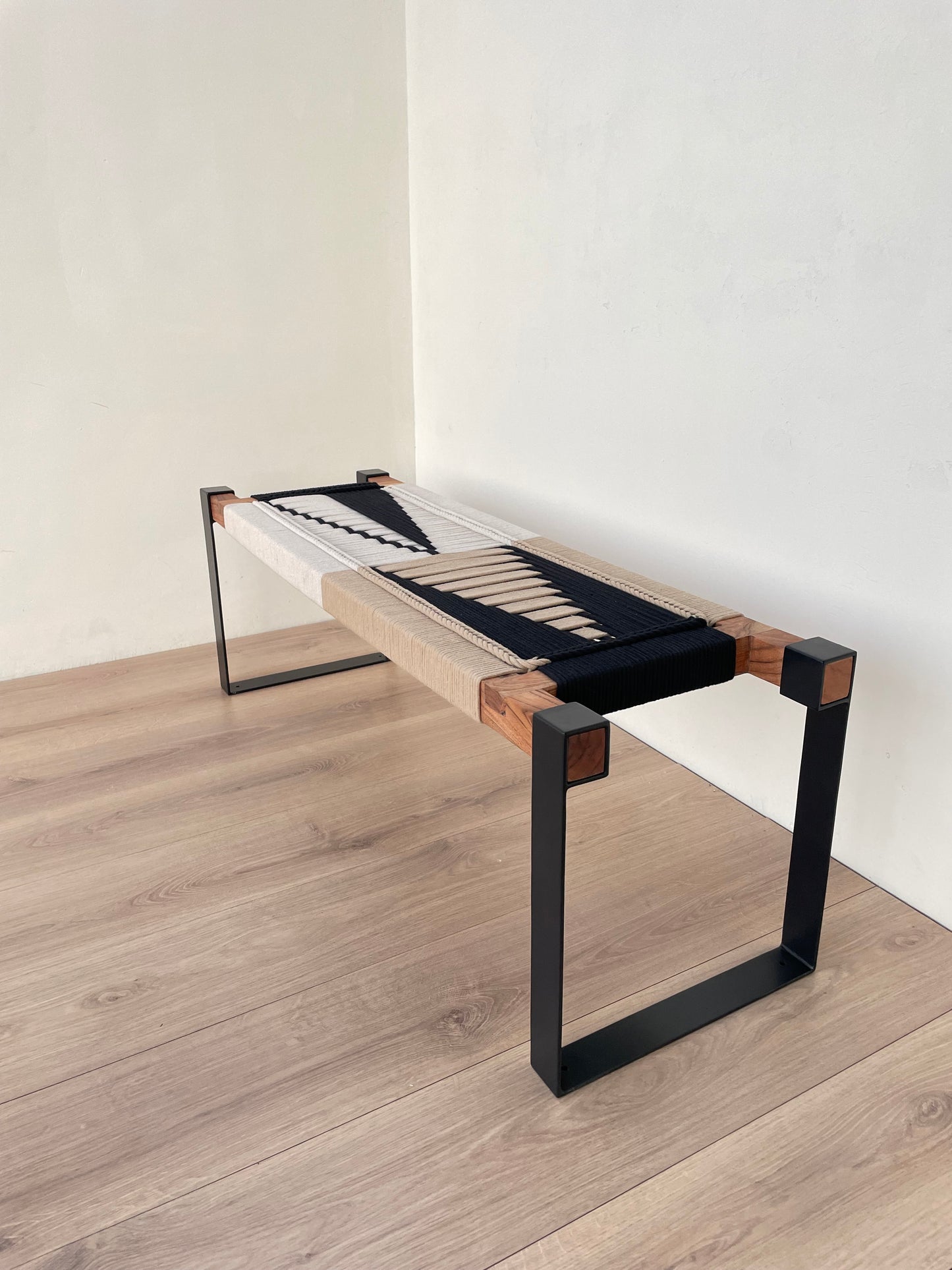 Draco woven bench in black metal legs