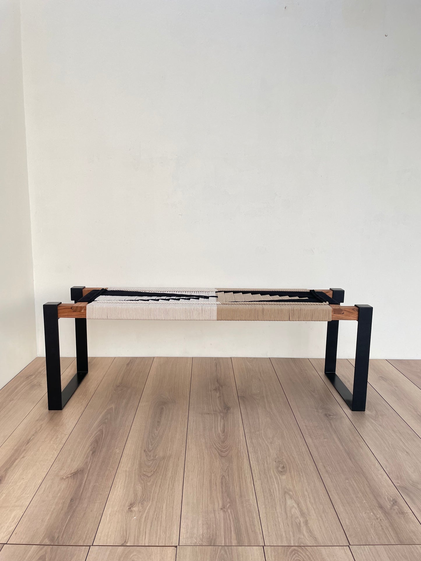 Draco woven bench in black metal legs