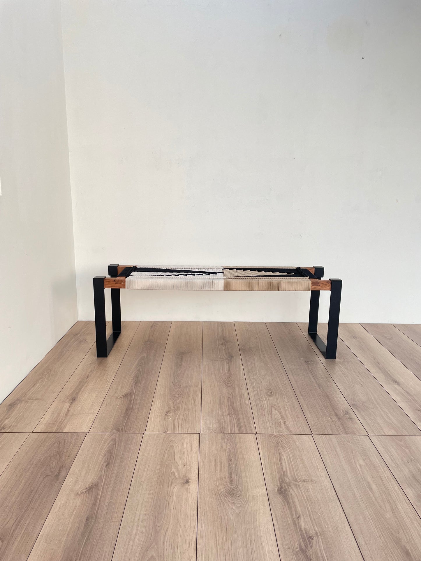 Draco woven bench in black metal legs