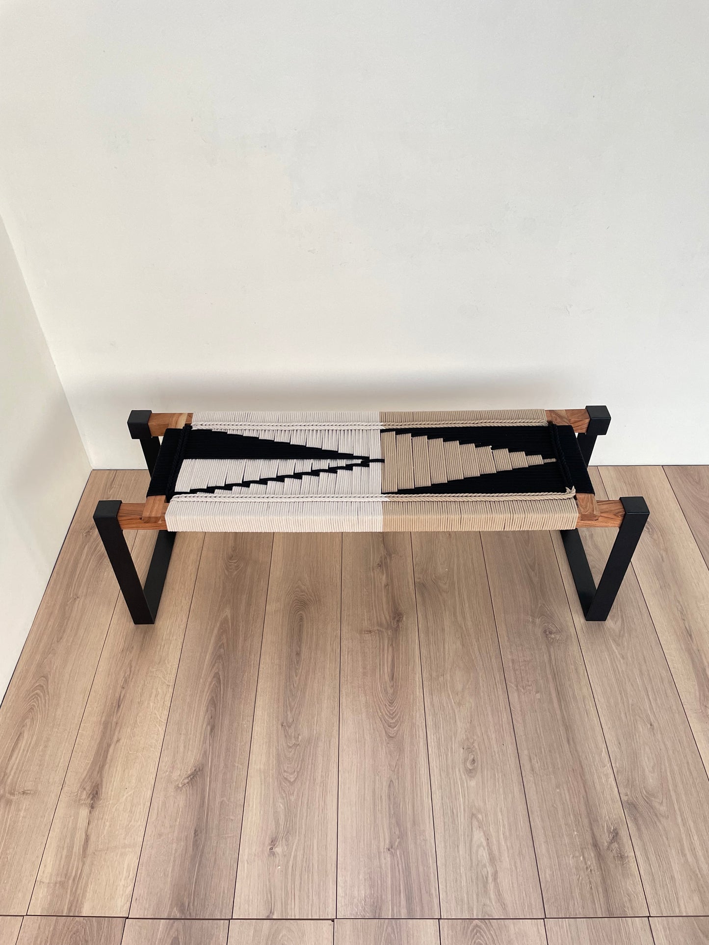 Draco woven bench in black metal legs