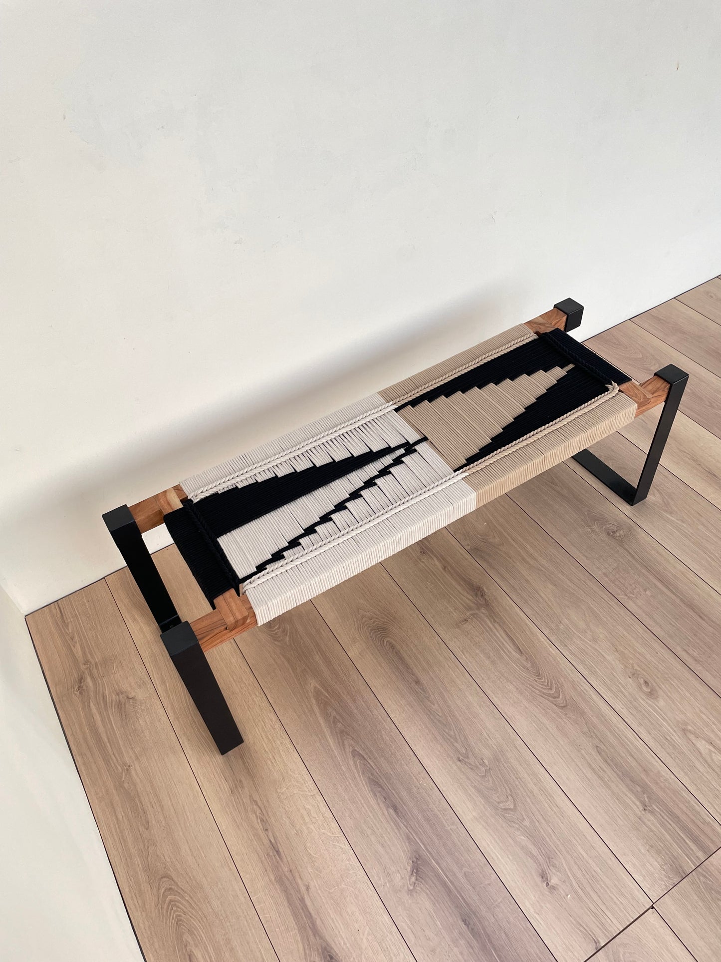 Draco woven bench in black metal legs