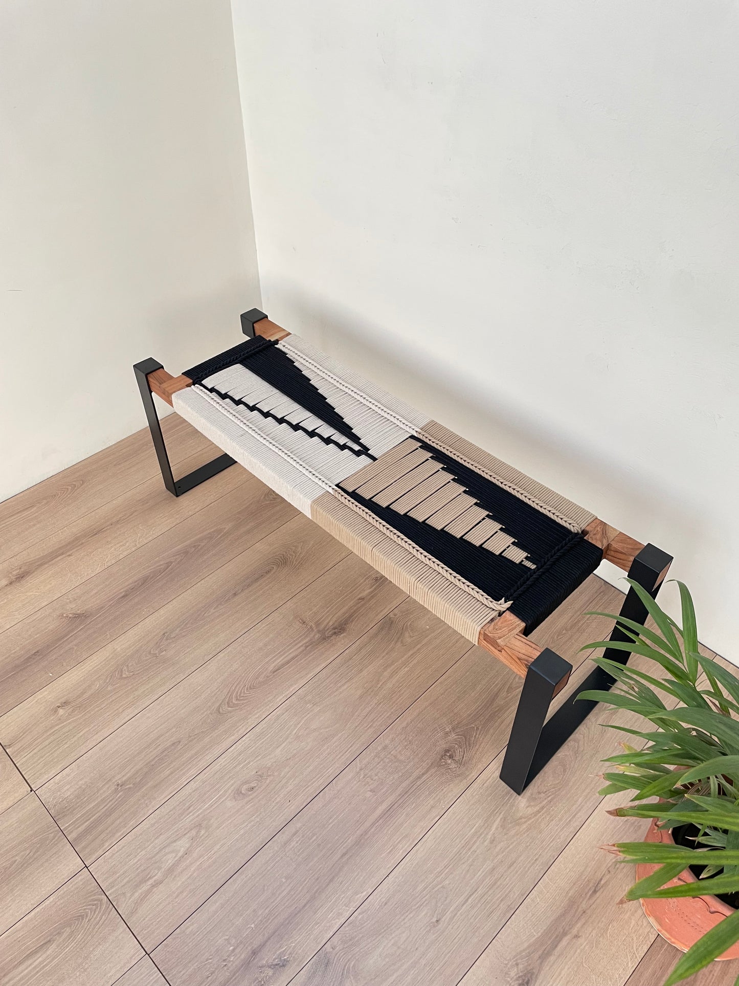 Draco woven bench in black metal legs