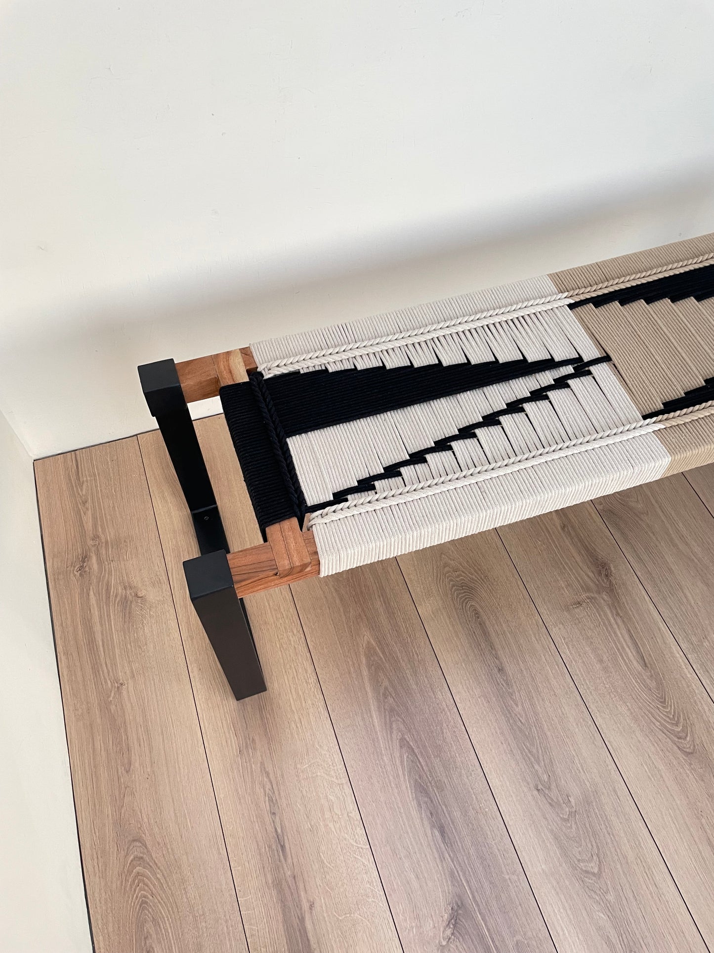 Draco woven bench in black metal legs