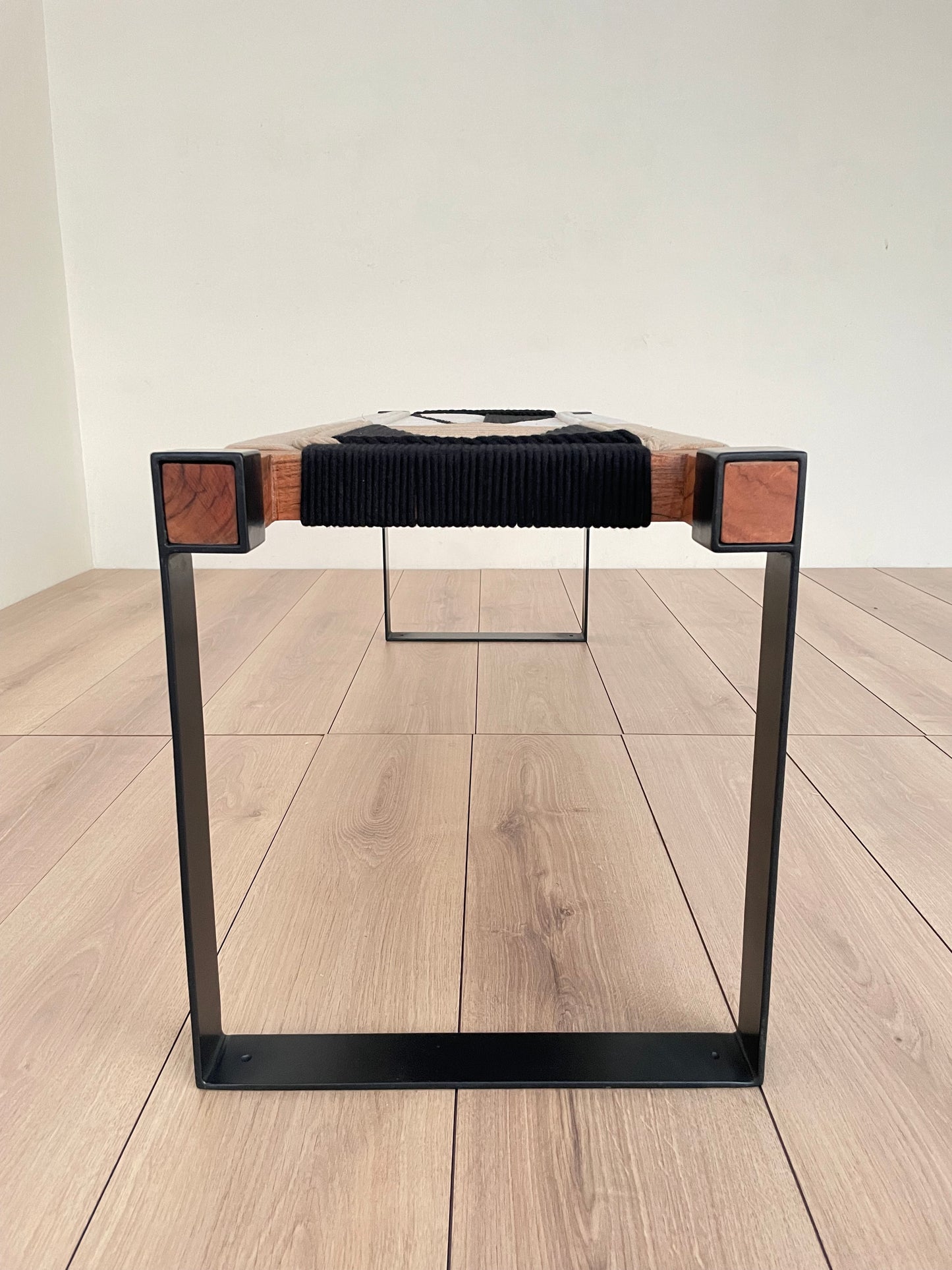 Draco woven bench in black metal legs